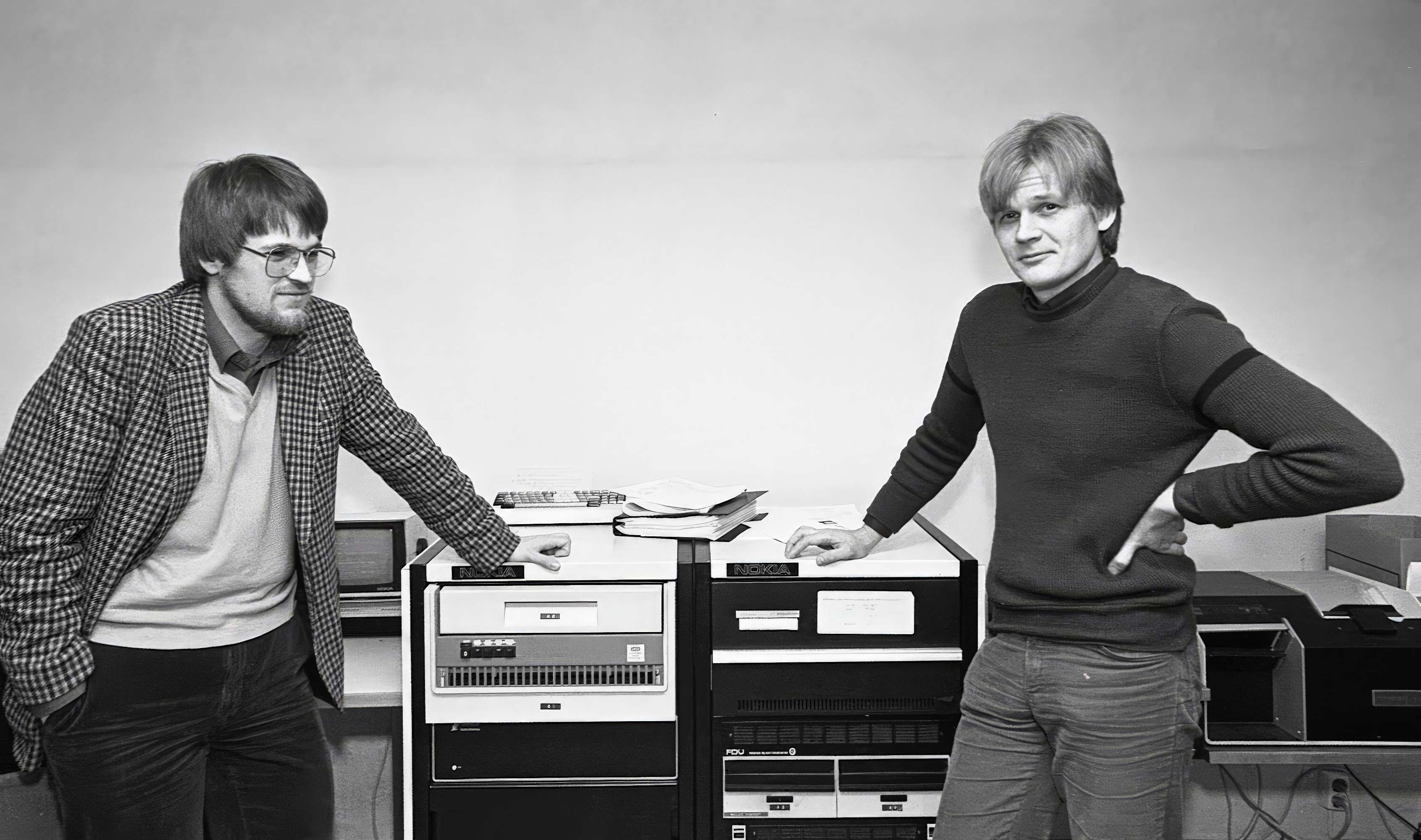 [Petri and Ilkka in front of A Nokia Mikko 3/36 minicomputer]